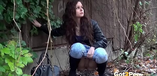 Shy Brunette Tries Public Pissing